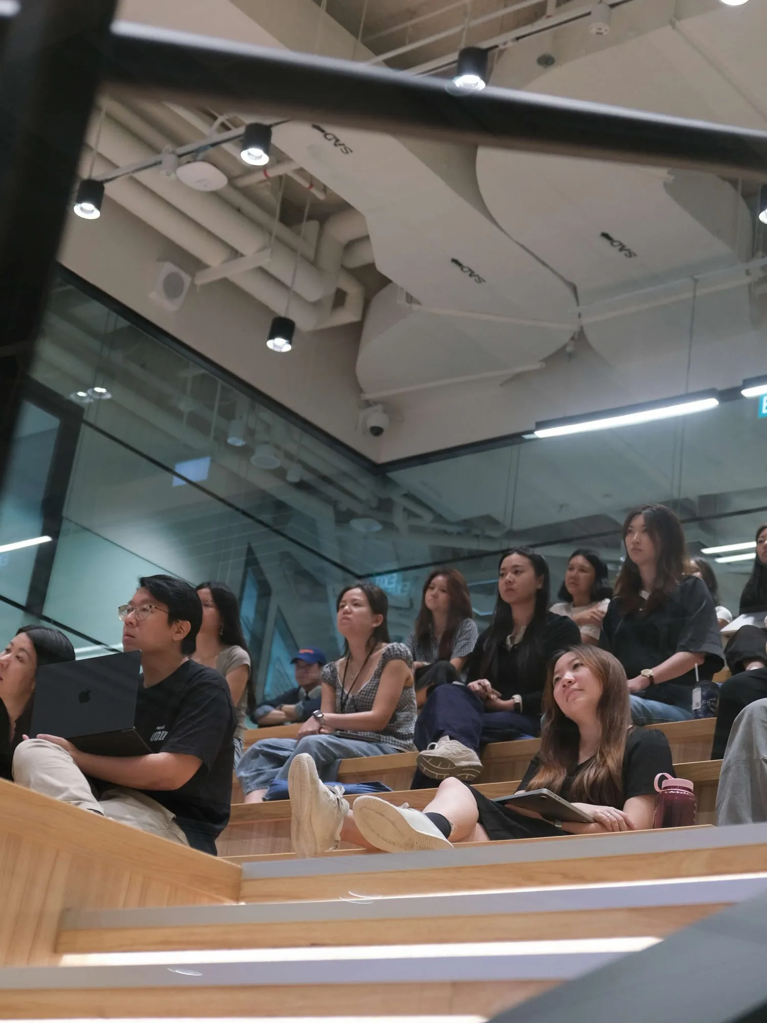The audience on the tiered seating during the talk.