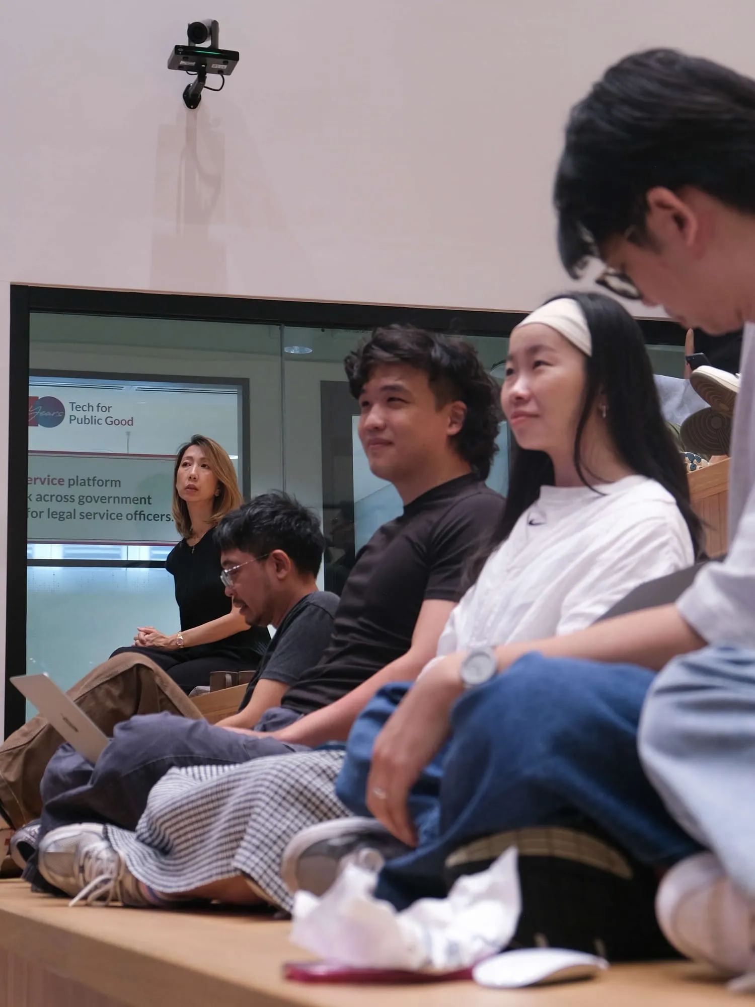 Attendees listening closely.