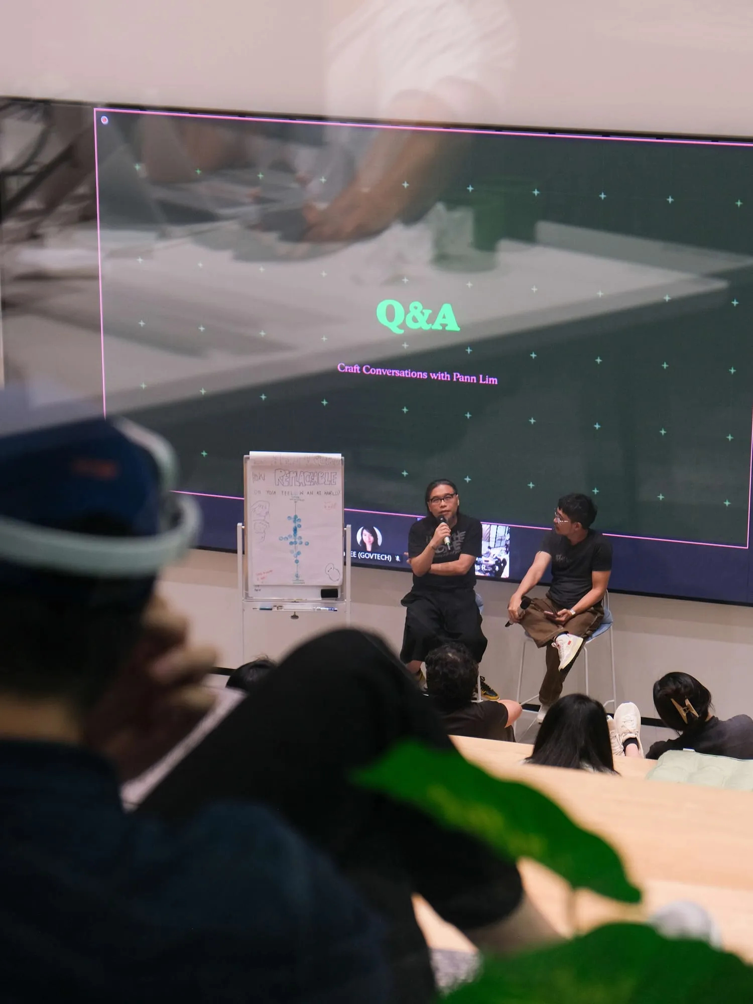 The Q&A session, seen from behind the audience.